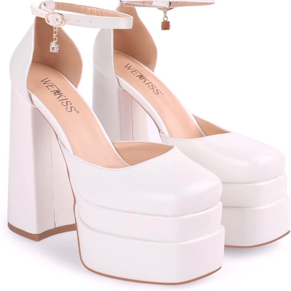 Wet kiss white platform heels. Worn once for an event.